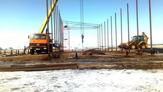 Аренда экскаватора погрузчика с ямобуром в Киселёвск цена от 1546 руб