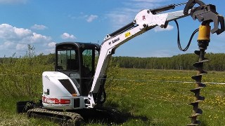 Аренда экскаватора погрузчика с ямобуром в Киселёвск цена от 1546 руб